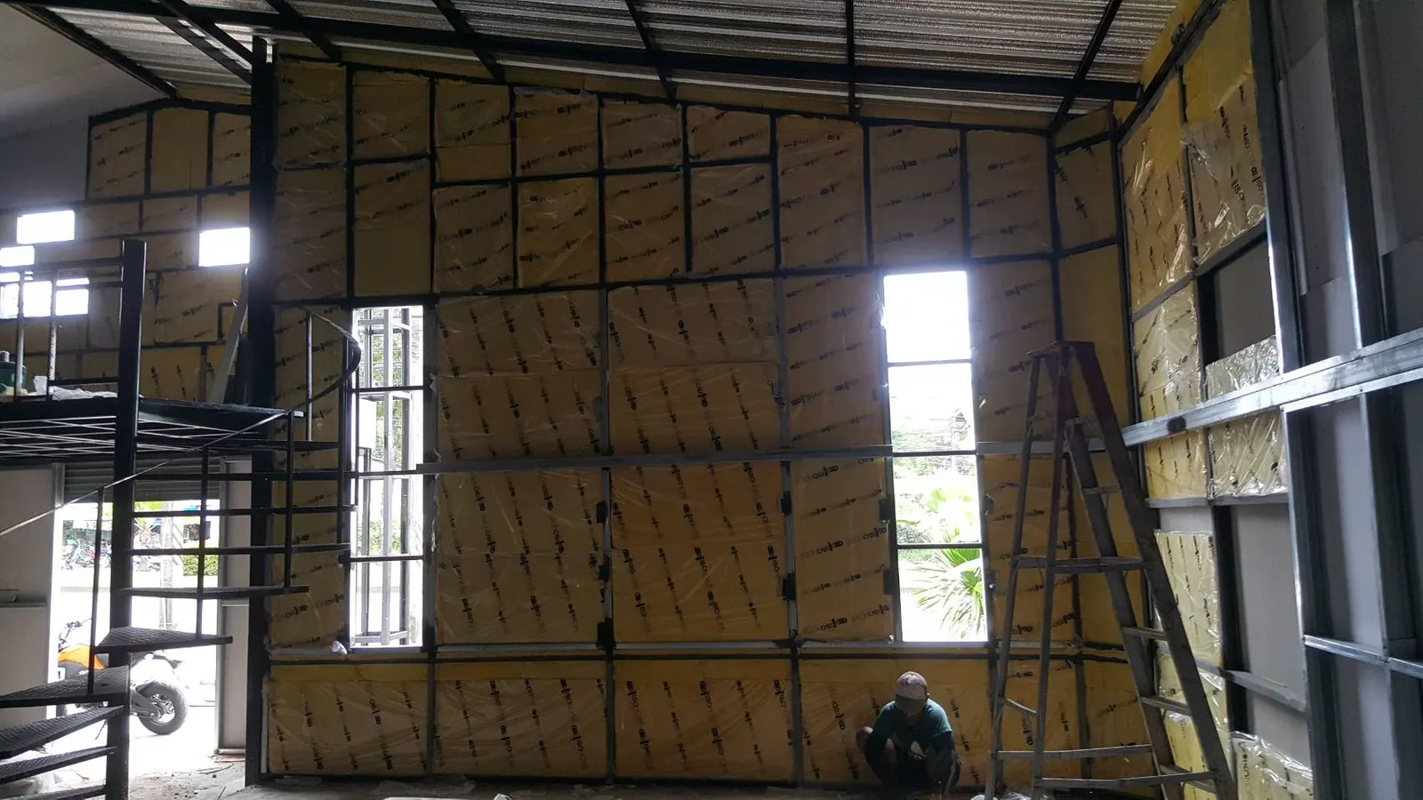 Site photo of ISO NOISE sound insulation being installed (1)